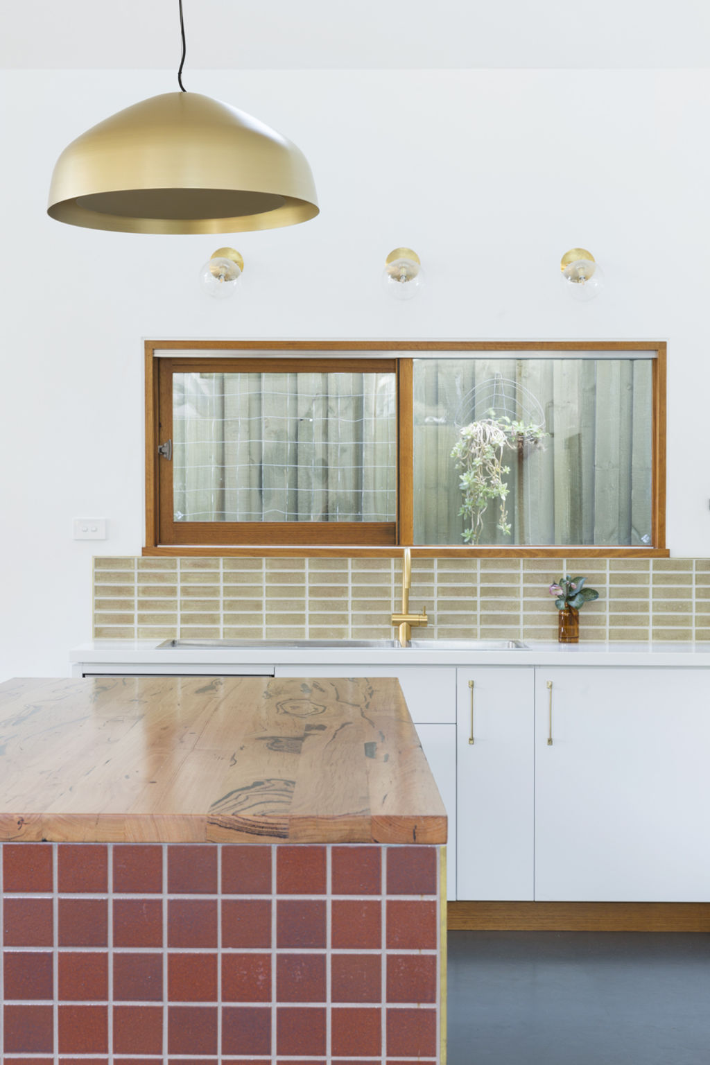 Brass finishings fit seamlessly with the palette. Interior design: Meredith Lee. Photo: Elizabeth Schiavello