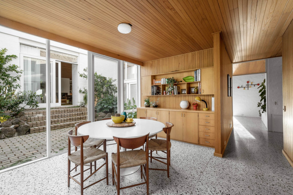 The couple has managed to let the mid-century design sing throughout the home. Photo: Taylor & Co Realty.