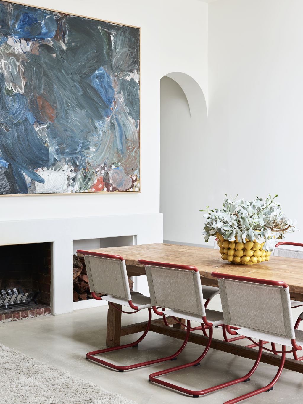 Many paintings are by Rolleston herself, and whenever a piece is sold, she creates a new one to hang in its place. Styling: Annie Portelli. Photo: Eve Wilson.
