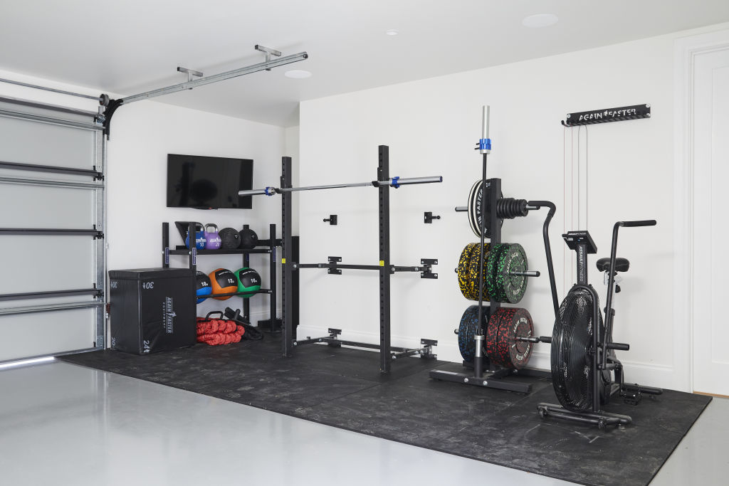 Love me or hate me? Jimmy and Tam's home gym in the garage. Photo: Channel Nine