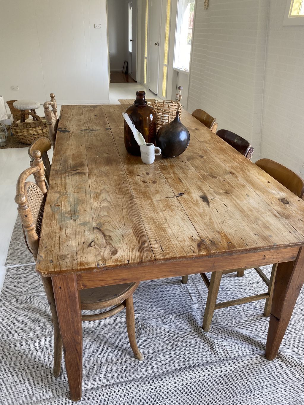 Meaningful pieces, including the dining table, furnish the house. Photo: Supplied