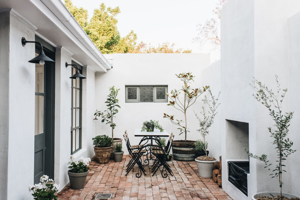 One of Jemima Aldridge's favourite design features is the bespoke outdoor fireplace. Photo: Abbie Melle Photography