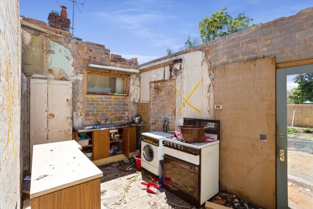 House with missing kitchen roof hits market for $780k-$830k