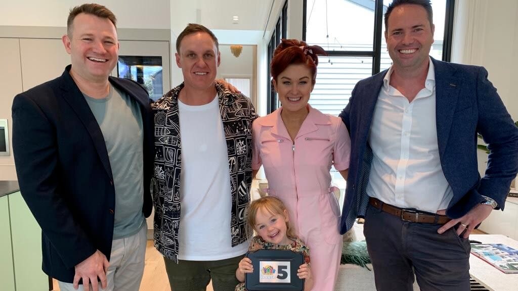 McGrath agent Michael Townsend (far right), with fellow agent Josh Stirling (L) and The Block 2020 winners Jimmy and Tam with daughter Frankie.