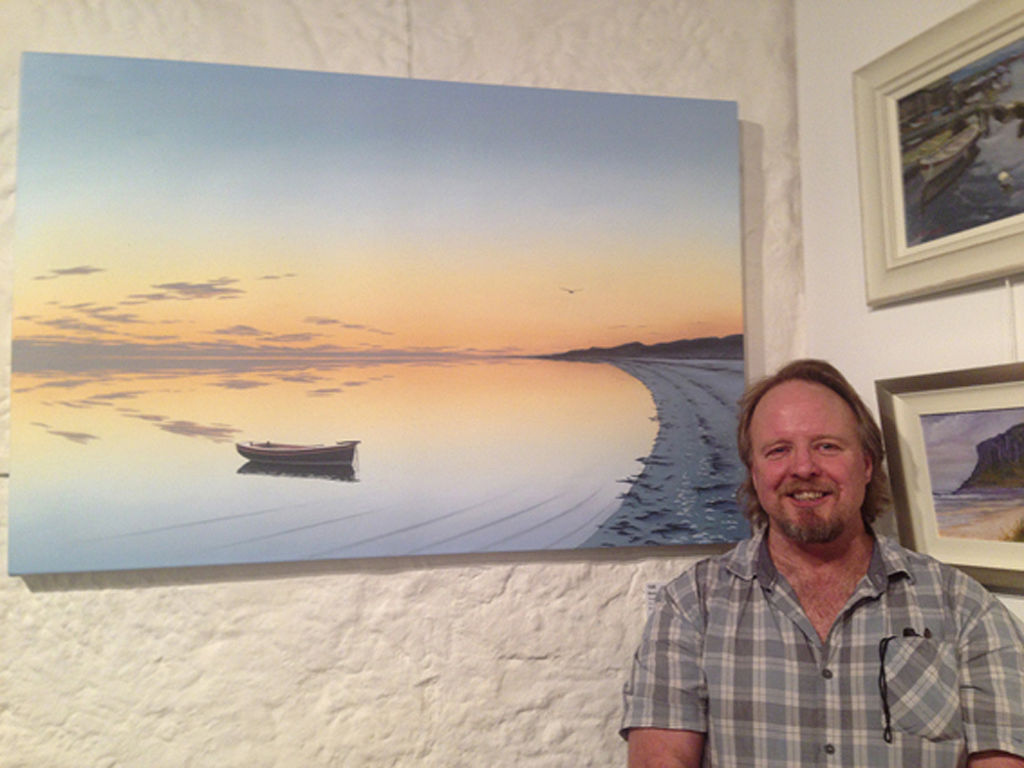 Richard Stanley with his painting Waterways. Photo: Supplied