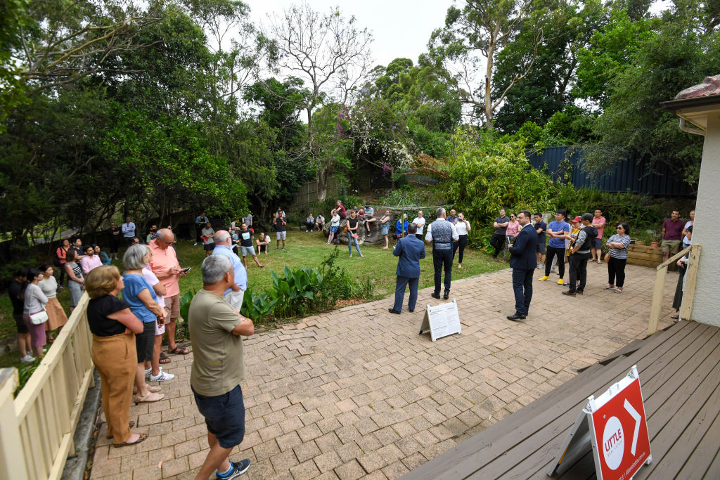 Dozens of buyers are turning up at auctions, squeezing many out of the market. Photo: Peter Rae
