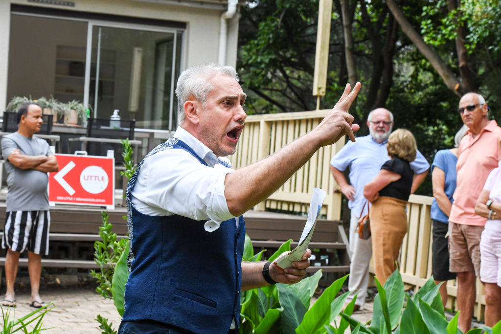 Auctioneer Tom Panos during the successful auction, which drew 16 registered bidders. Photo: Peter Rae