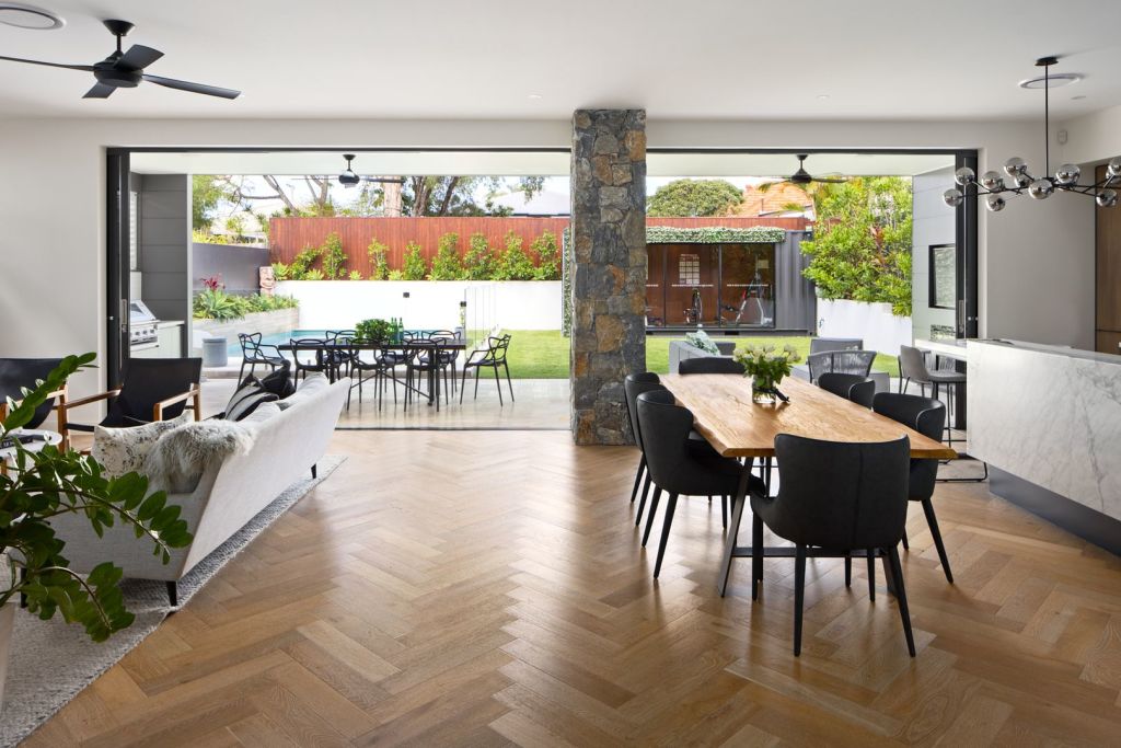 Open-plan living looking out to the pool and gym at 39 Ormuz Road, Yeronga. Photo: Ray White New Farm