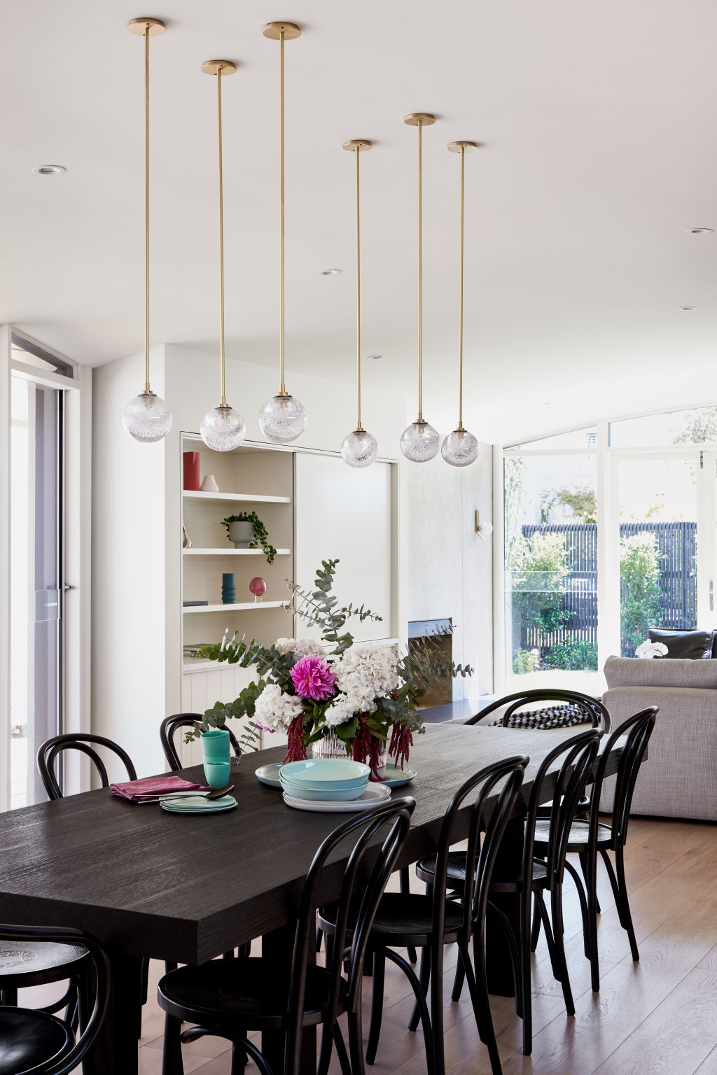 Statement lighting at The Curved House by The Retreat Stylist. Photo: Stephanie Rooney