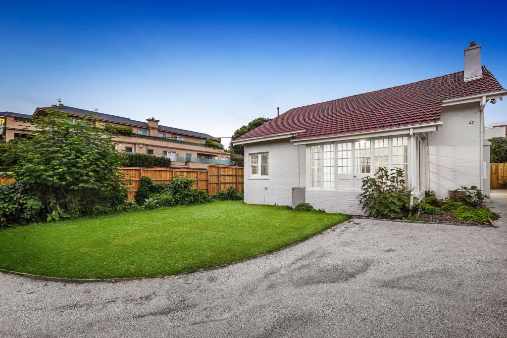 Geelong Grammar has sold two Toorak properties, including this sprawling home at 22 Douglas Street.
