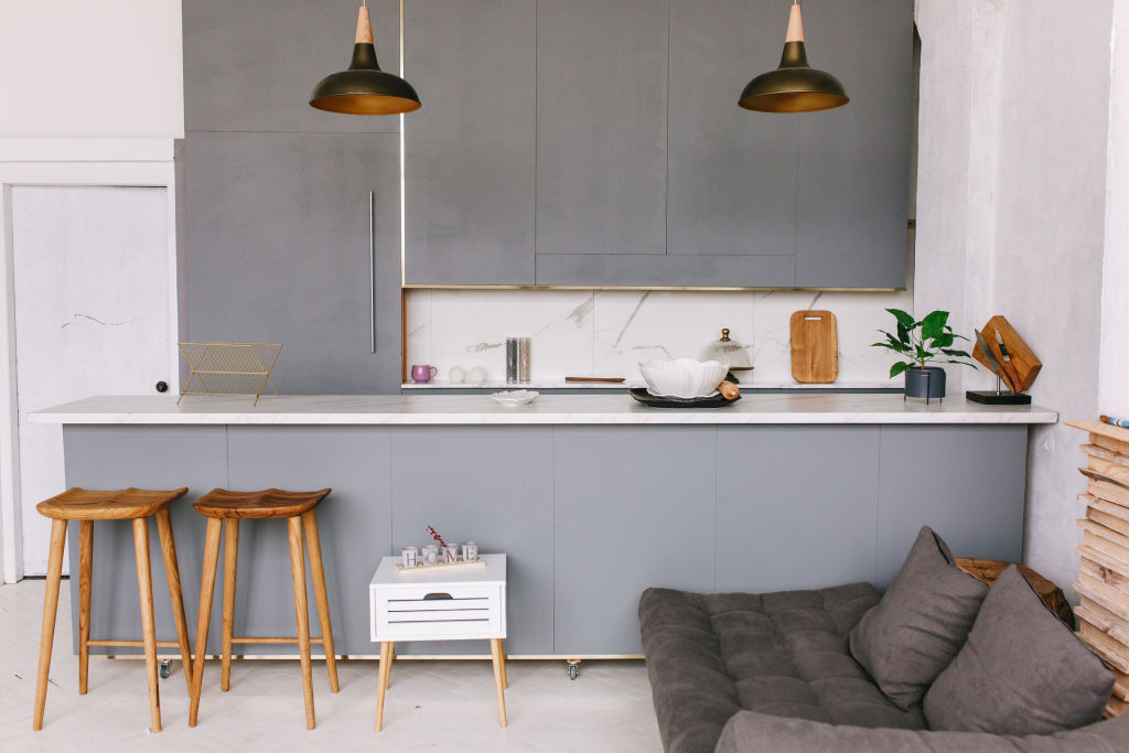 Painting an apartment is straightforward, but updating kitchens, bathrooms and even flooring may require permission from the owners corporation. Photo: iStock