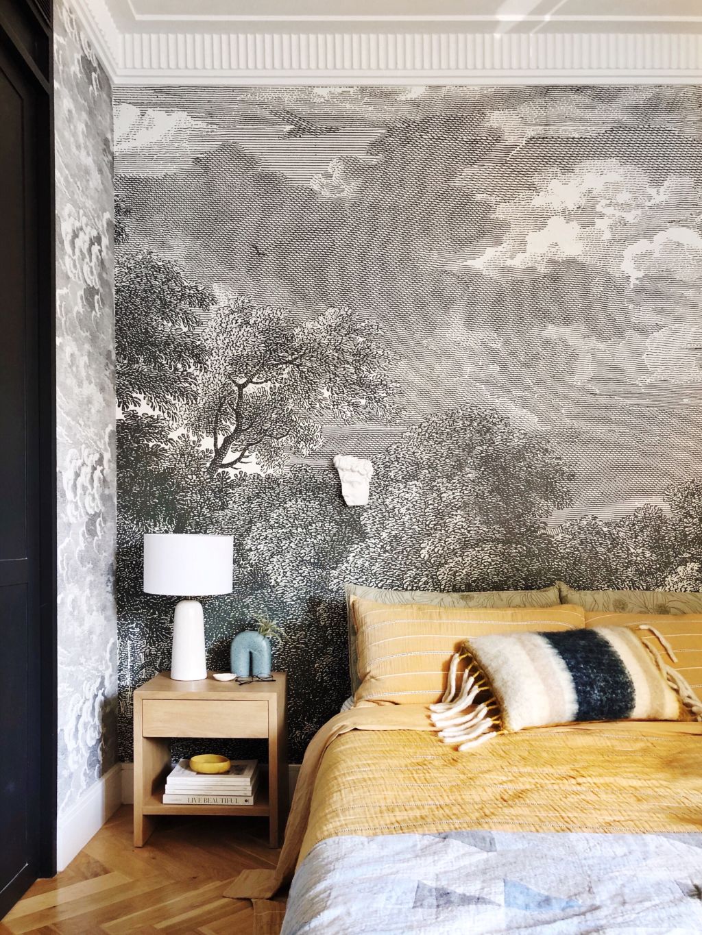 Making an impact: Interior stylist Jono Fleming showcases how grey and yellow can work in the bedroom. Quilt cover from Adairs. Photo: Jono Fleming