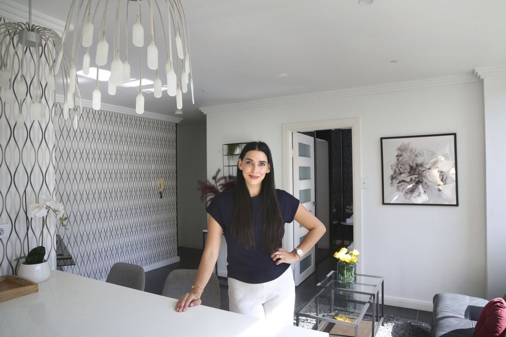 SMH DOMAIN: Portrait of Emily Demirdonder with one of her apartments in the inner city suburb of Darlinghurst in Sydney. January 16, 2021: Photograph by James Alcock/NINE Media.