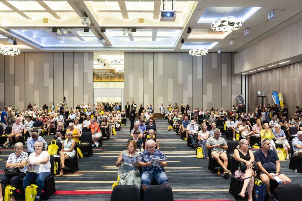 Crowds socially distance at Ray White Surfers Paradise Group's annual auction event. Photo: Marc Pricop