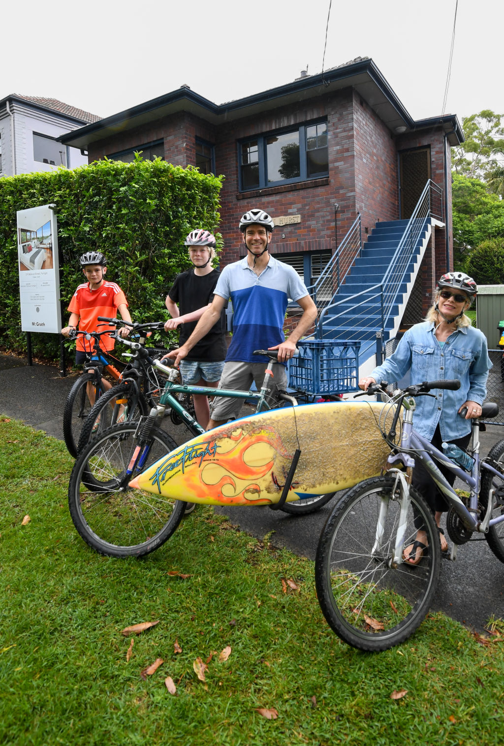 Fairlight homeowners Michael Barrett and Olivia Jenkins with their sons Luke and Patrick. Photo: Peter Rae