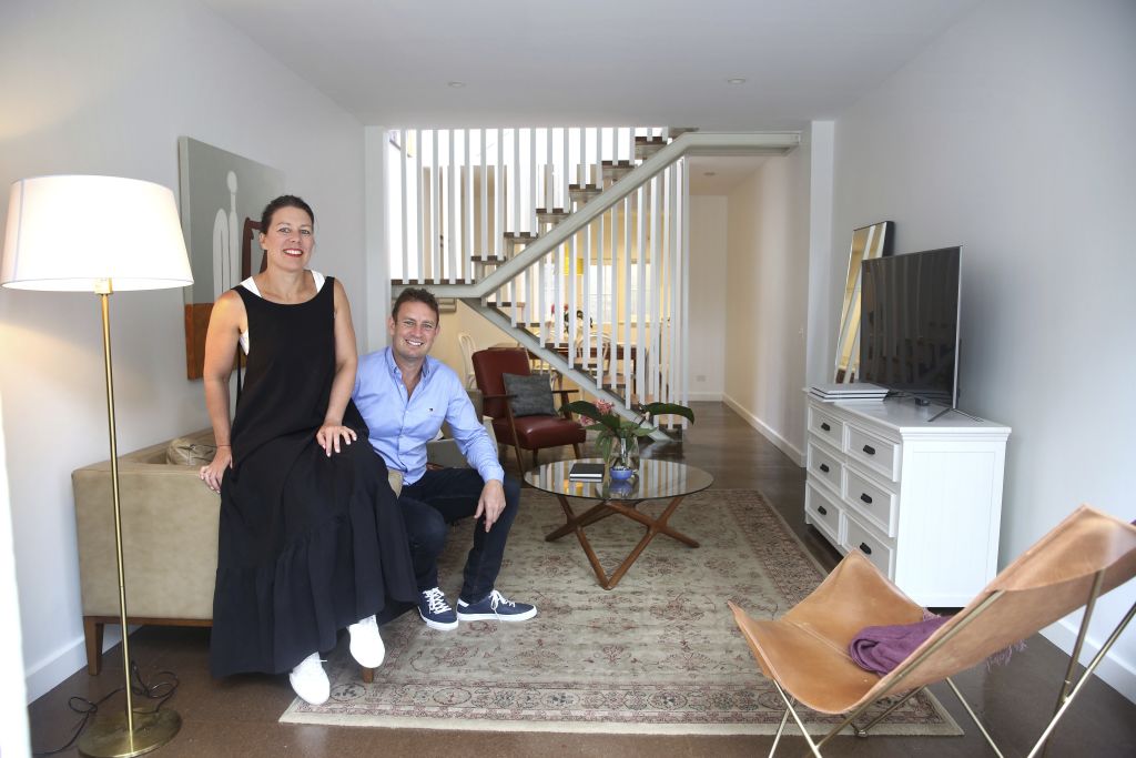 Jo Hardy and her husband Mike at their Glebe home. Photo: James Alcock