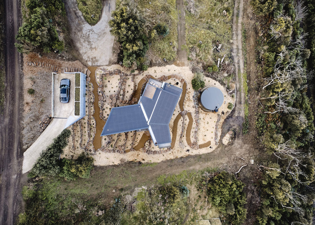Making visible the Y shape of the replacement holiday house the aerial also shows the extend of the on site effluent dispersal field. Photo: Peter Bennetts