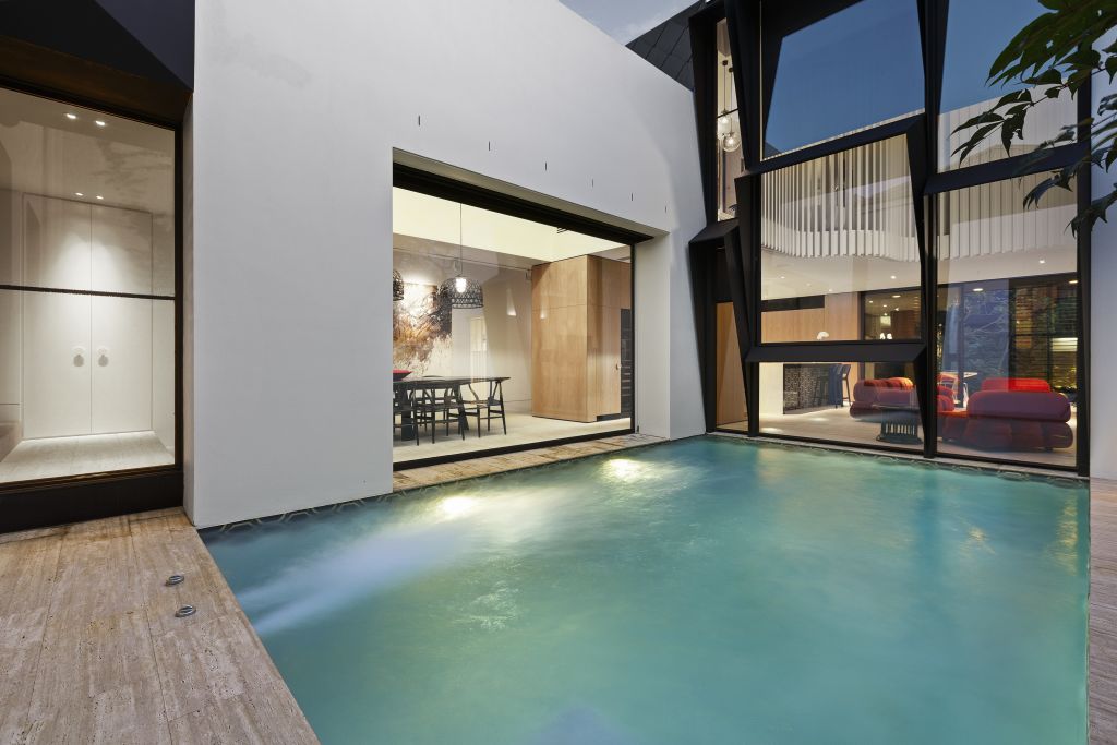 Rooms surrounding the pool are treated to serene views.  Photo: Greg Hocking Holdsworth.