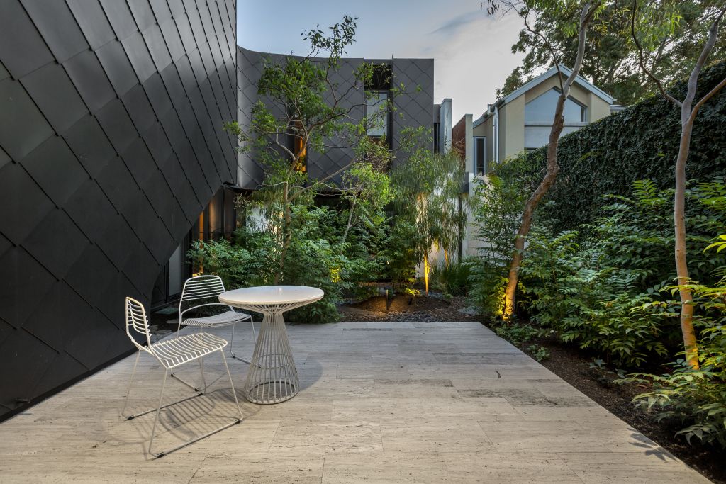 The outdoor entertaining space with built-in barbecue.  Photo: Greg Hocking Holdsworth.