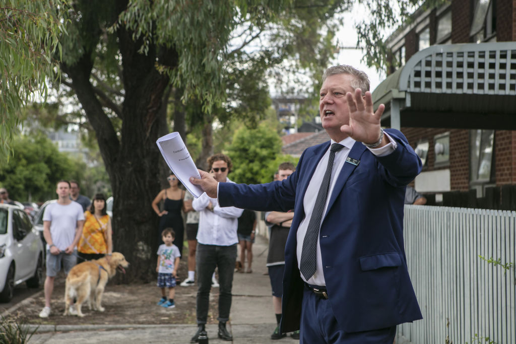 Jellis Craig auctioneer Mitchell Boys at the hotly-contested auction of a Brunswick fixer upper. Photo: Stephen McKenzie