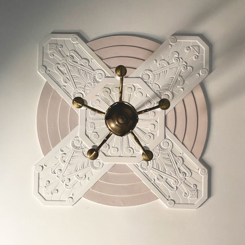 Every ceiling rose in every room is different and the light fittings are 1949 originals. Photo: Krisi Patras