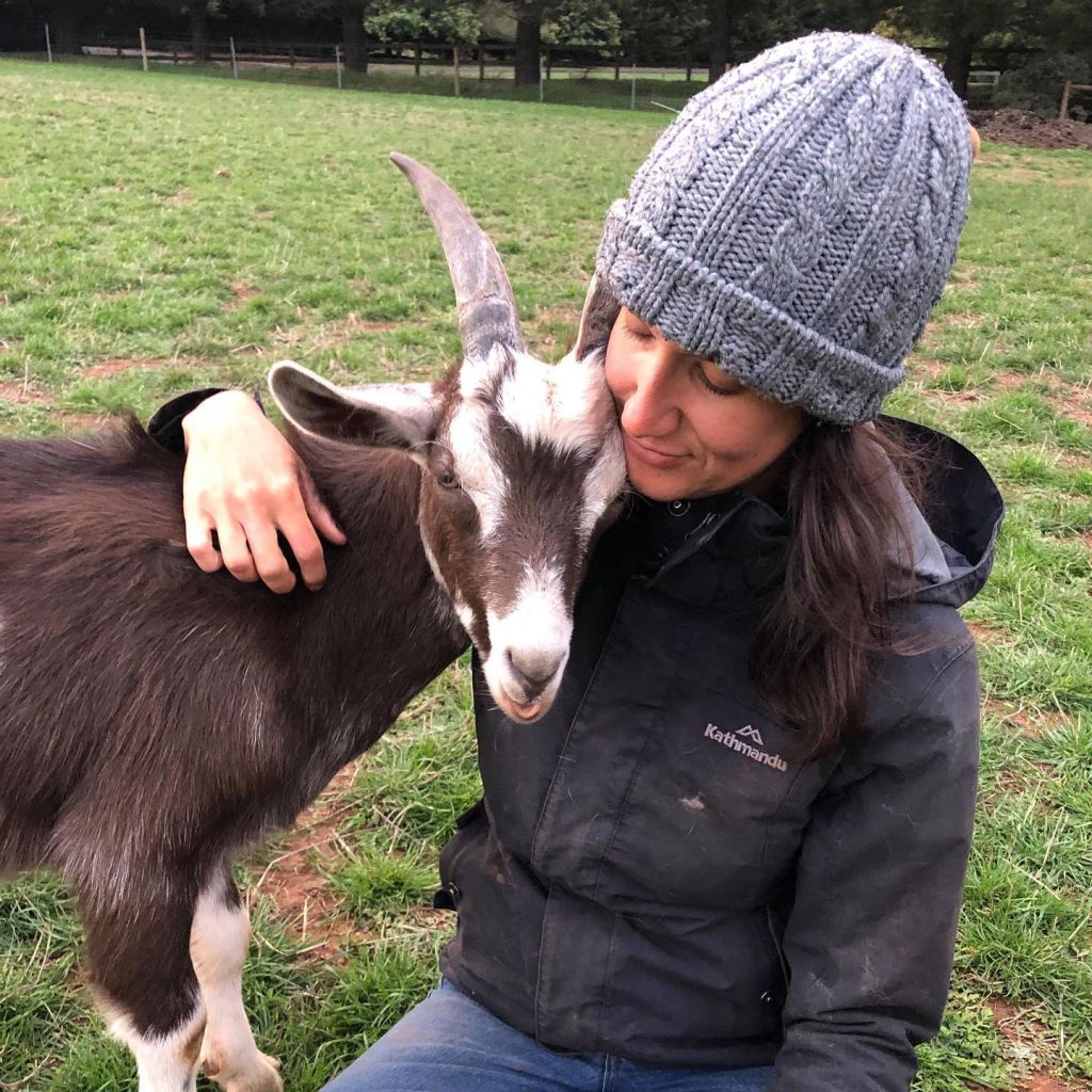 Cricket the goat and Grewal at home in Romsey. Photo: Supplied