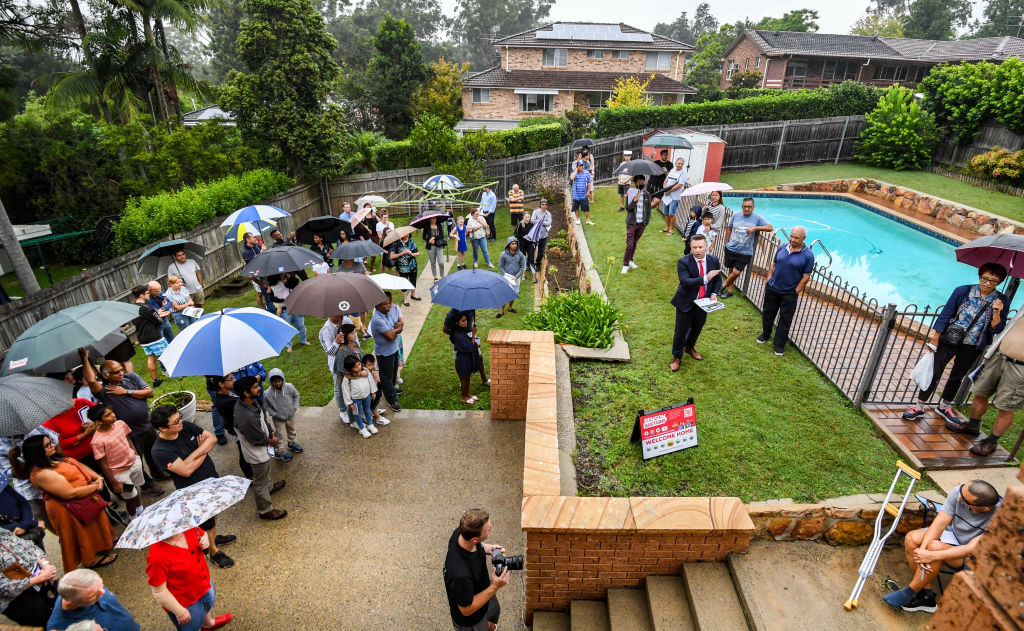 Yet another rainy auction Saturday that barely held crowds and registered bidders back. Photo: Peter Rae