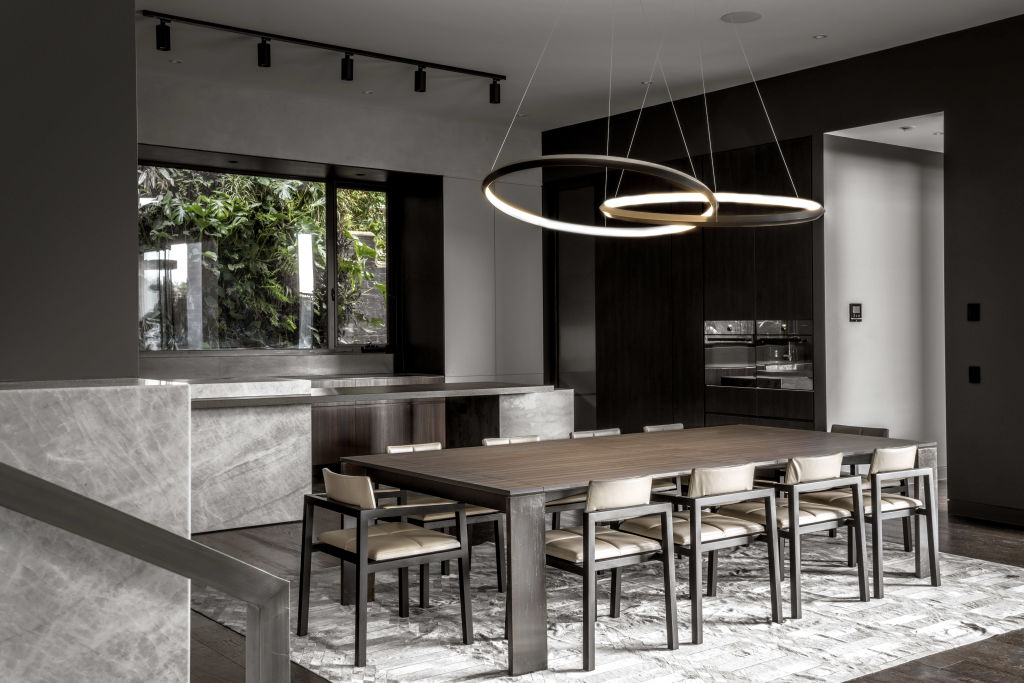 The home features dark and earthy tones. Photo: Marshall White Stonnington
