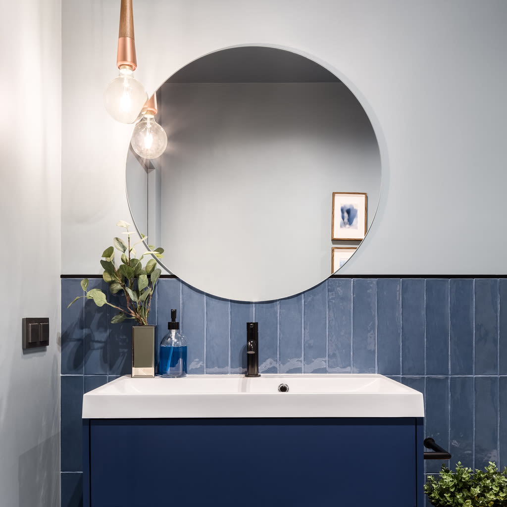 Place lights on either side of the vanity mirror for effective task lighting. Photo: iStock