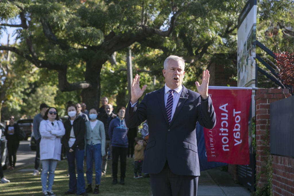 Auctioneer Andrew Hayne from Marshall White Stonnington at 21 Howie Street, Glen Iris. Photo: Stephen McKenzie