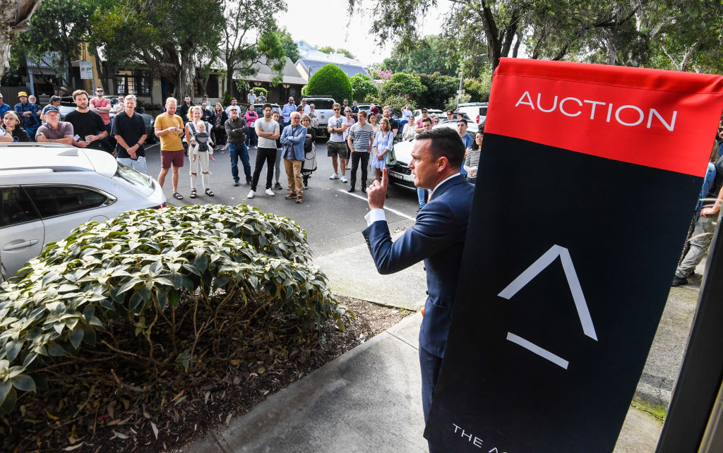 Damien Cooley took offers from five of the bidders. Photo: Peter Rae