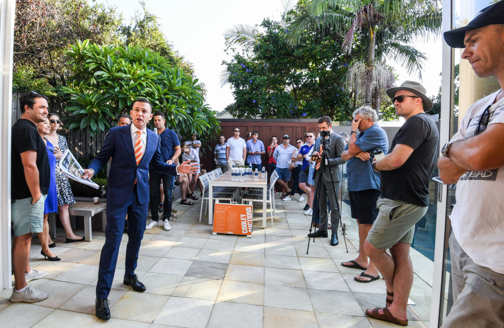 Damien Cooley, of Cooley Auctions, in action at 21-23 Merton Street, Rozelle. Photo: Peter Rae