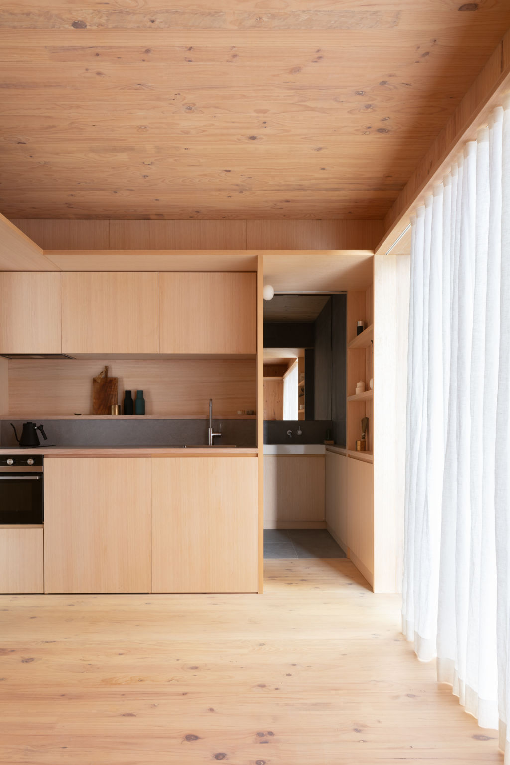 At just 20 square metres, the original Minima embraces kitchen, bathroom, living and sleeping spaces. Photo: Clinton Weaver