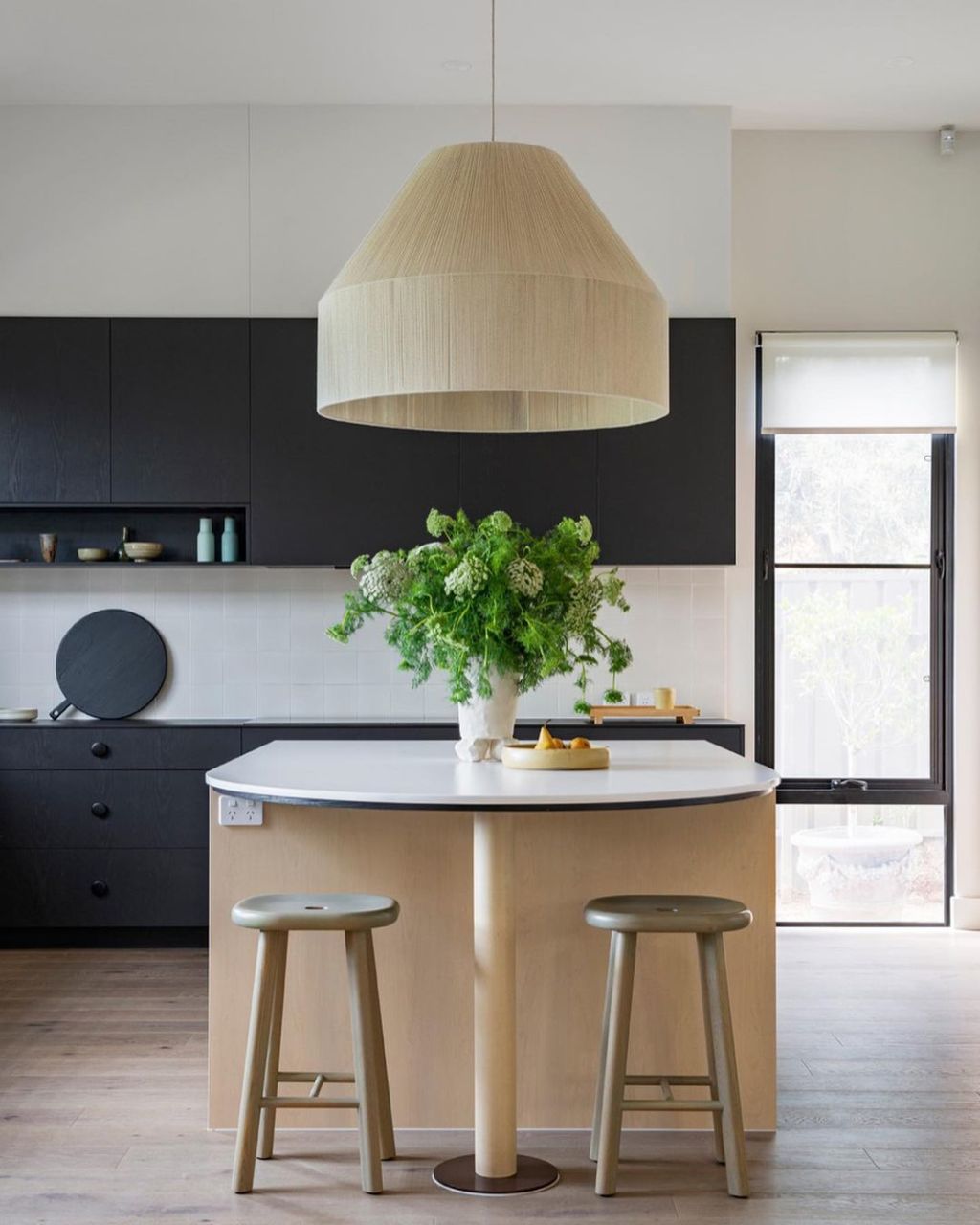 Wilson suggests playing with a contrast of darker and lighter wood tones. Pop and Scott light in home by Fabrikate Creative Spaces. Photo: Instagram: @popandscott