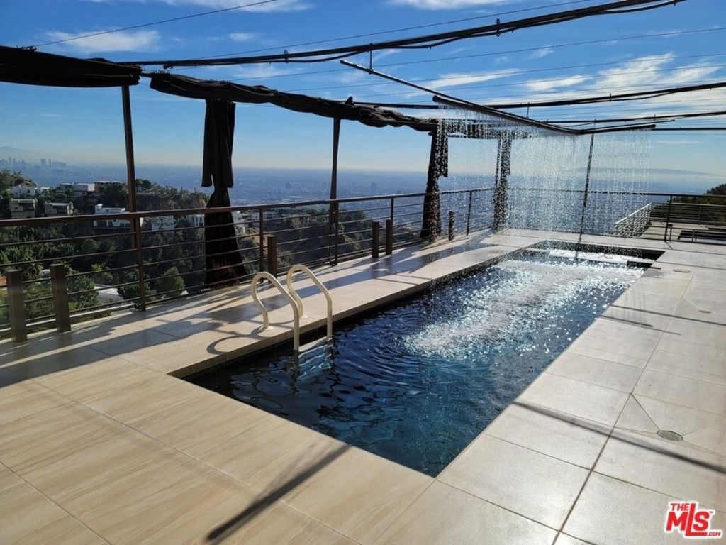 The home has a Moroccan-themed pool area. Photo: The MLS.com