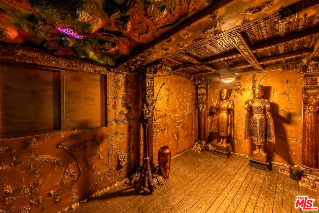 The cave-style rooms include unique statues. Photo: The MLS