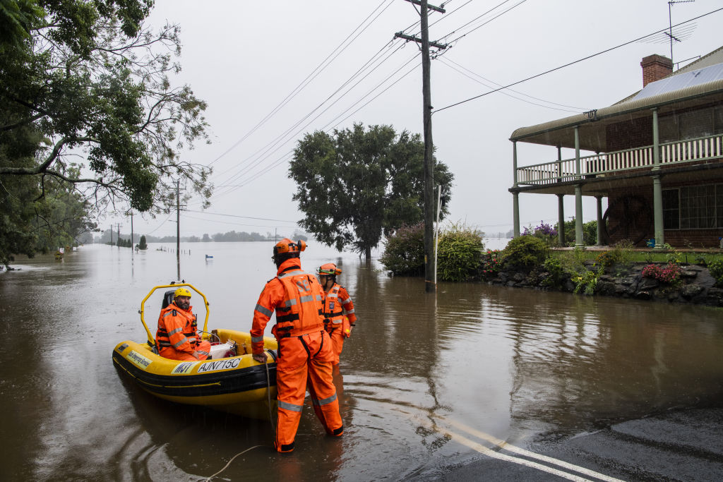 SES volunteers heading out to Ebenezer with Hawkesbury River flooding George St, Windsor today. Photo: Louise Kennerley