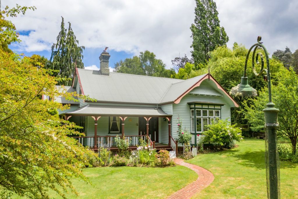 Prepare to feel envious: The picture-perfect house that the McLennan family were able to buy for much cheaper than they could get in Brisbane, at Castle Forbes Bay, Tasmania. Photo: Supplied