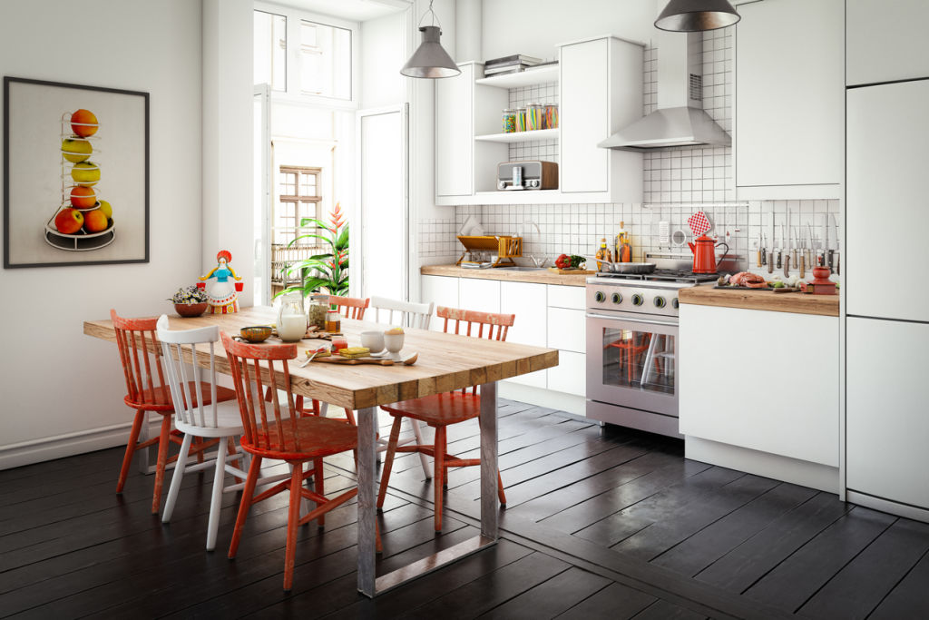 A simple way to brighten your dining space is to paint the dining chairs. Photo: iStock