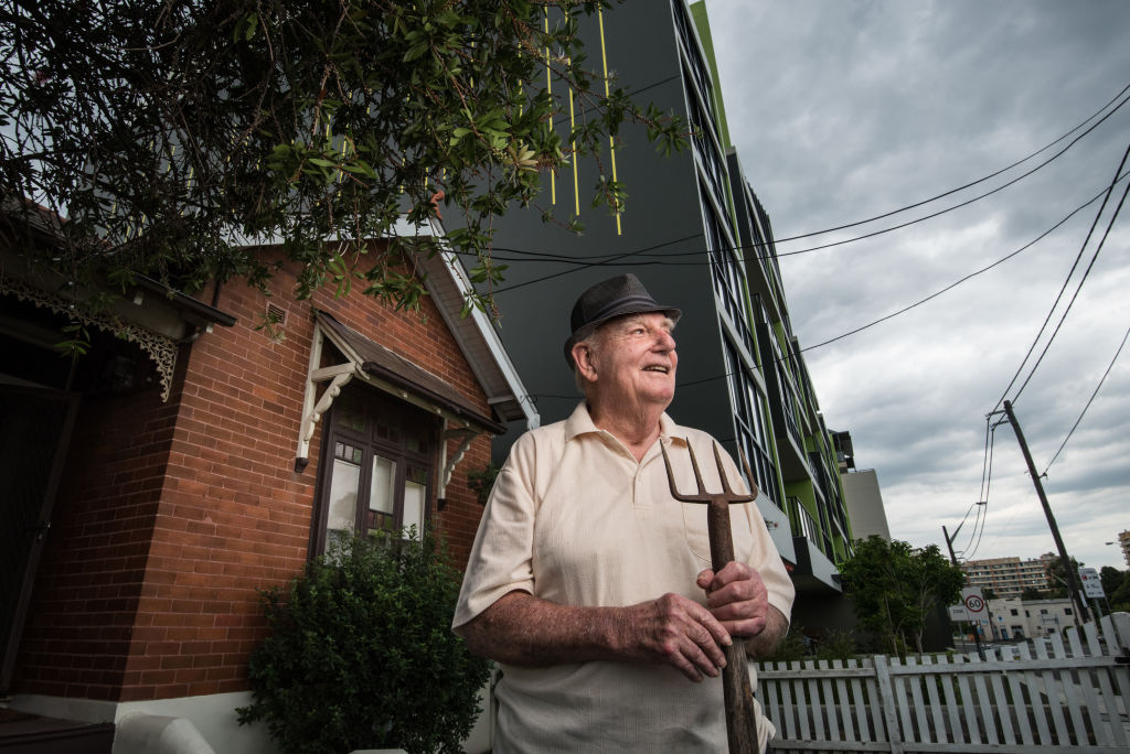 Barrie Dickson, pictured at home in March 2016. His steadfast stance against developers buying him out won him much admiration, and turned his house into a local landmark. Photo: Wolter Peeters