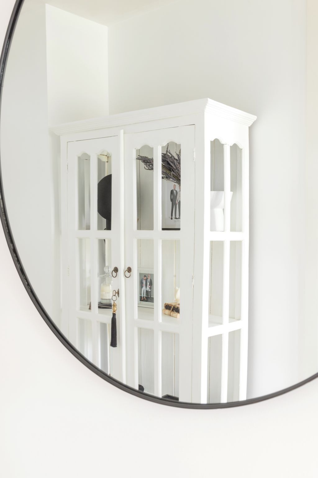 Another up-cycle by the pair: this vintage cabinet from mahogany varnished timber to an elegant white. Photo: Haus of Cruze