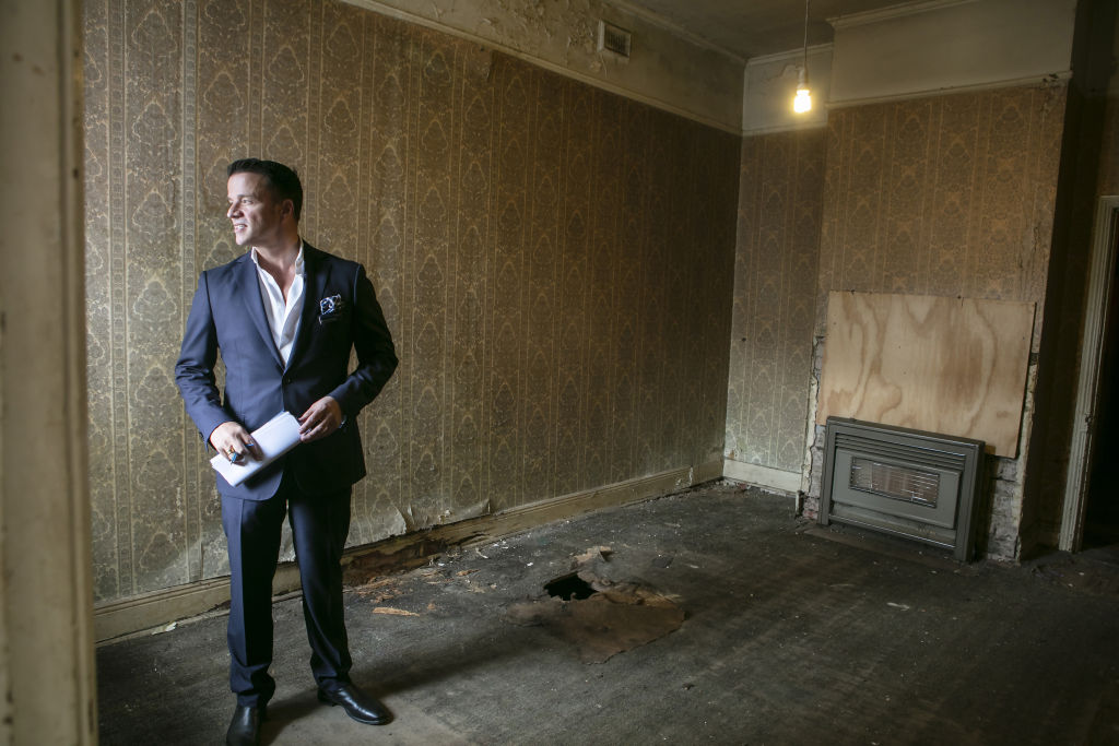 A hole in the floor didn't stop seven bidders raising their hands. Photo: Stephen McKenzie