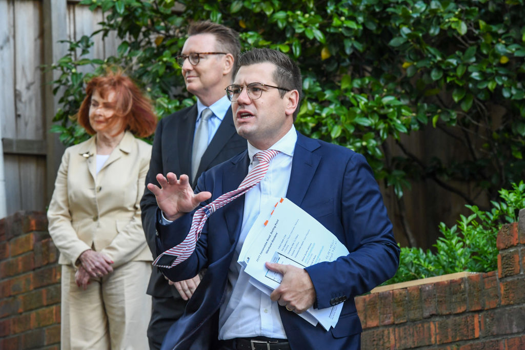 Auctioneer Jesse Davidson brought the hammer down at a $1.7m bid. Photo: Peter Rae