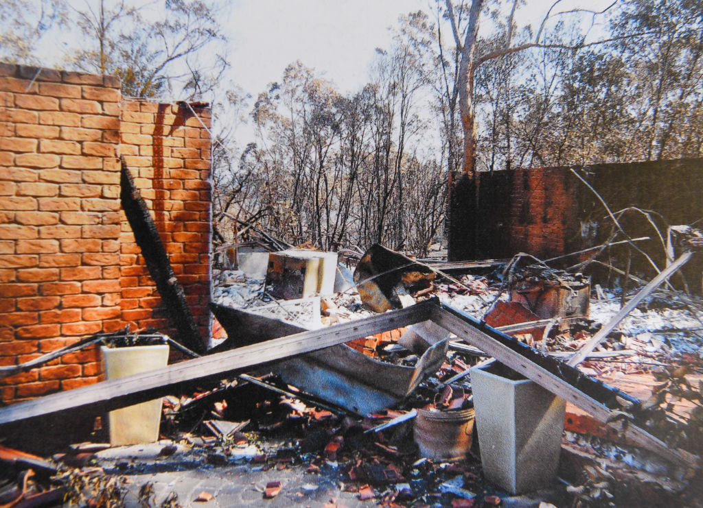 Photo copy of the damage done to Jan and Ken Gilmore's home which they say they were only able to recover a few possessions from Photo: Peter Rae