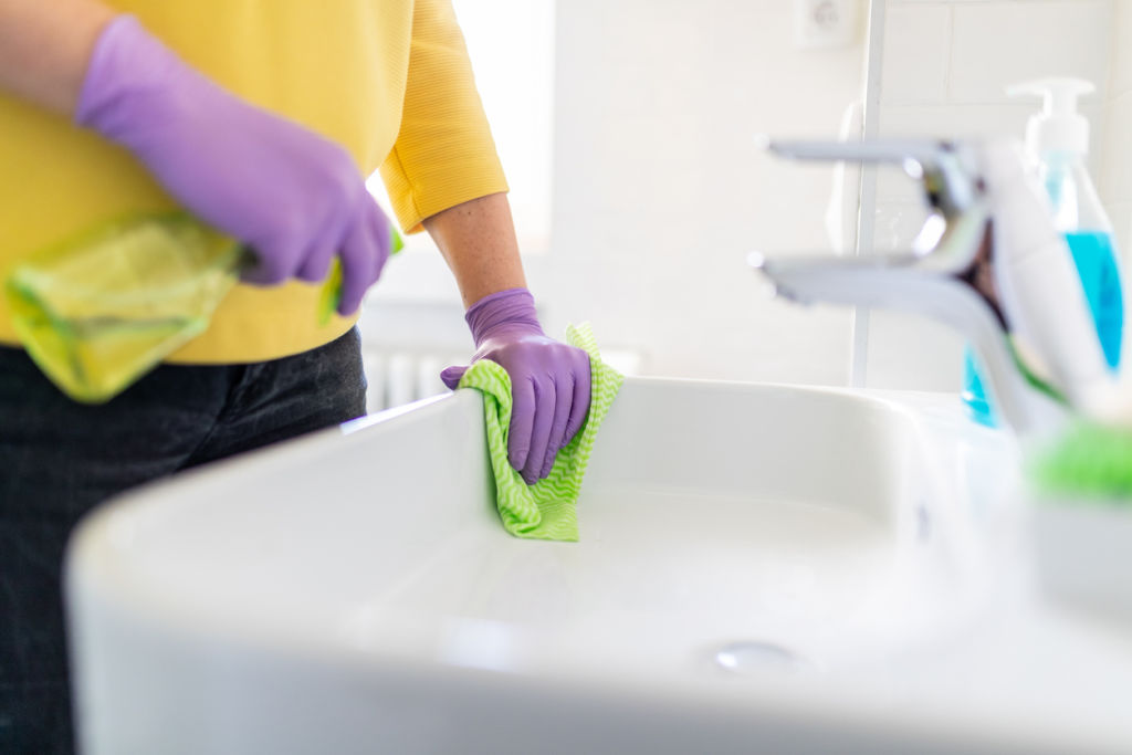 Wipe down your bathroom basin daily. Photo: iStock