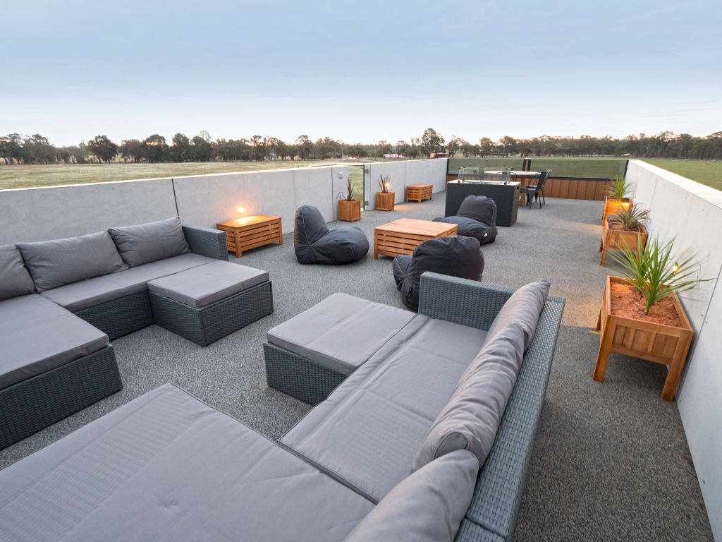 The roof-top entertaining area with views of the surrounding land. Photo: Serana Hunt-Hughes