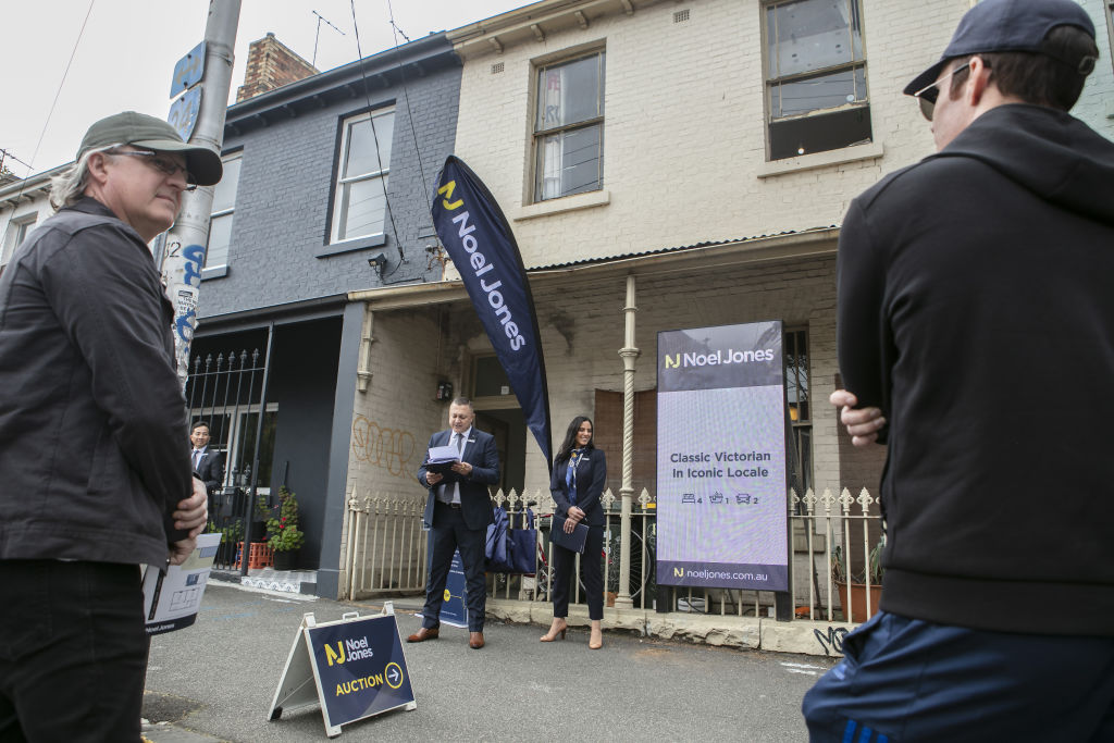 A run down Carlton share house sold for $1.455 million at auction on Saturday. Photo: Stephen McKenzie