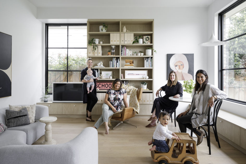 BuildHer Collective co-founders at the renovated home of Maddie Tippens. Photo: Supplied