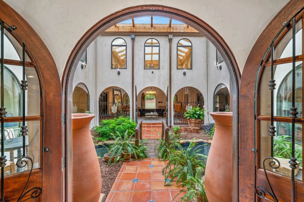 The courtyard, with a water feature and bridge. Photo: BARTOLOTTI PHOTOGRAPHY/ATLANTA FINE HOMES SOTHEBY'S INTERNATIONAL REALTY