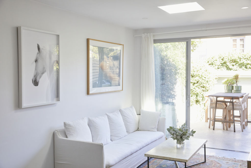 A white couch with two young kids might seem crazy, but the removable linen cover means Freedman can easily wash it when needed.  Photo: Nicky Ryan